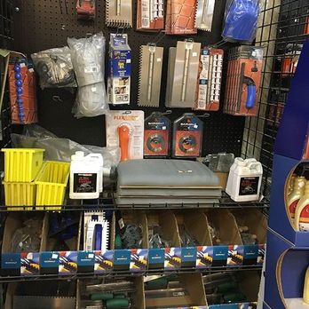 Assortment of tile tools and materials