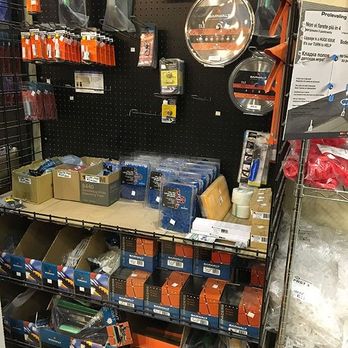 Assortment of tile tools and materials